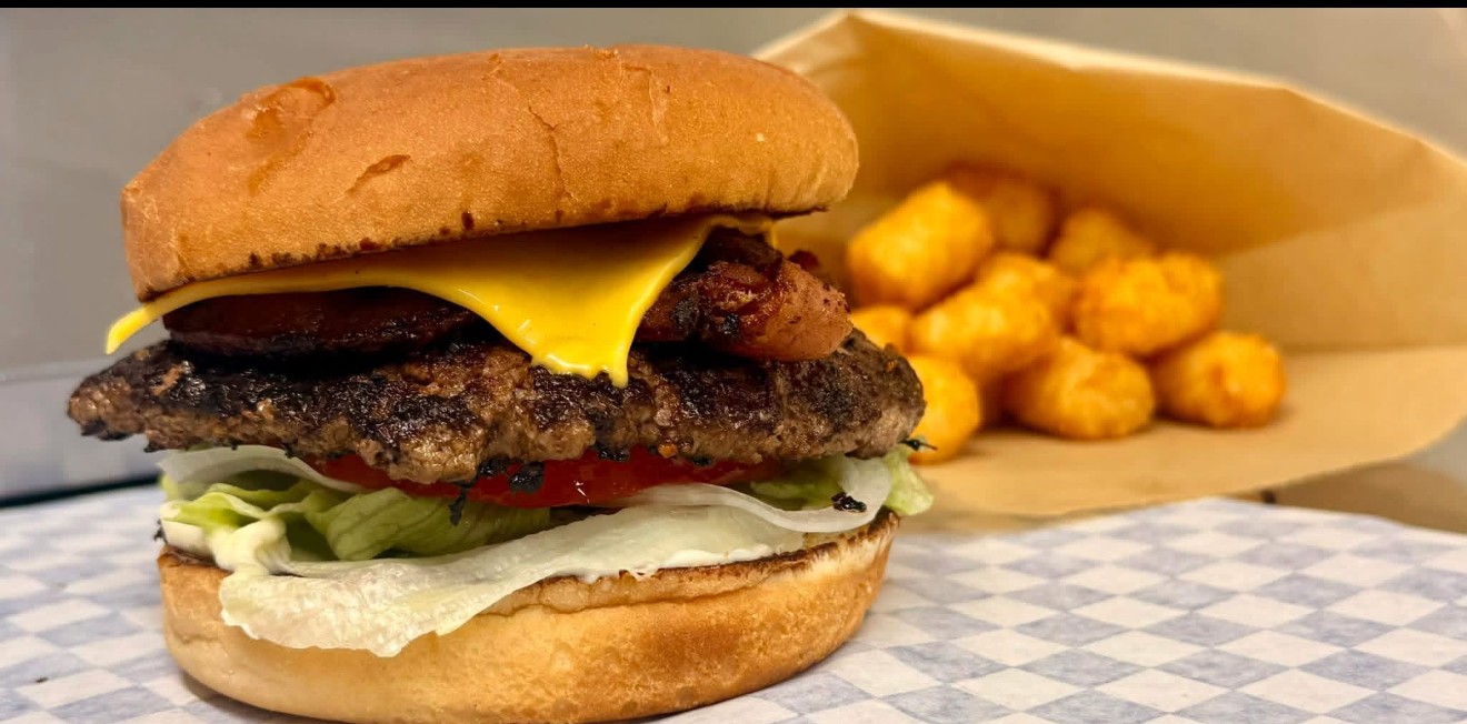 Bacon cheeseburger with a side of tater tots
